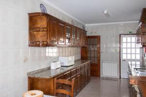 Kuchyň nebo kuchyňský kout v ubytování Casa de Vilarinho