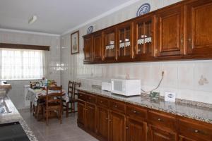 Kuchyň nebo kuchyňský kout v ubytování Casa de Vilarinho