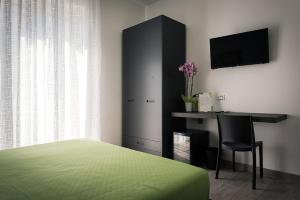 Katil atau katil-katil dalam bilik di L'Agrumeto