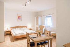 Postel nebo postele na pokoji v ubytování Smart Liv'in Laabnerhof