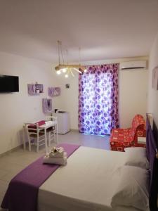 Postel nebo postele na pokoji v ubytování B&B Extremo Sud