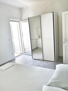 Posteľ alebo postele v izbe v ubytovaní Villa Panorama Seget
