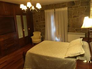 Ένα ή περισσότερα κρεβάτια σε δωμάτιο στο Casa Ameán +35 φωτογραφίες