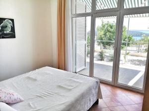 Posteľ alebo postele v izbe v ubytovaní Villa Panorama Seget