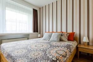 Voodi või voodid majutusasutuse Flat at the Danube with wellness toas
