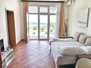 Posteľ alebo postele v izbe v ubytovaní Villa Panorama Seget