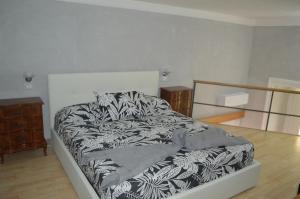 Łóżko lub łóżka w pokoju w obiekcie Petros Room Camere