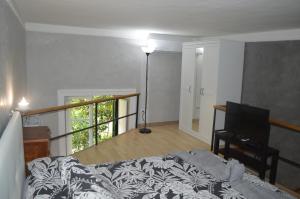 Łóżko lub łóżka w pokoju w obiekcie Petros Room Camere