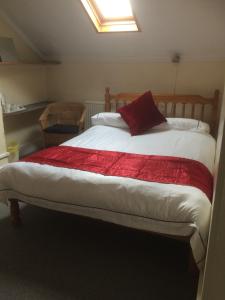 A bed or beds in a room at Bay Lodge