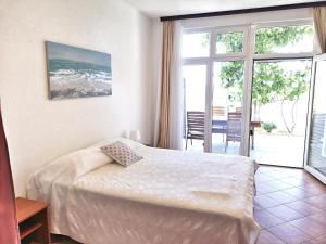 Posteľ alebo postele v izbe v ubytovaní Villa Panorama Seget