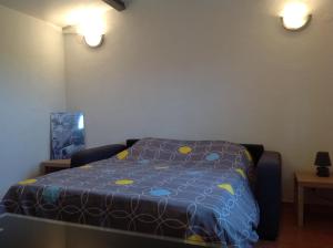 Ένα ή περισσότερα κρεβάτια σε δωμάτιο στο Grand studio