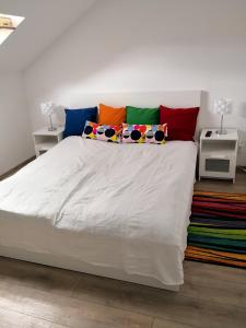 Postel nebo postele na pokoji v ubytování Green Garden Plus Apartman