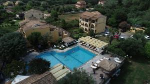 an aerial view of a house with a swimming pool at Spiti Nikos in Danilia