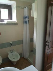 Kúpeľňa v ubytovaní Le Chianine dei Tognoli + 16 fotografií
