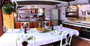 Reštaurácia alebo iné gastronomické zariadenie v ubytovaní Villa Spa Las Tinajas