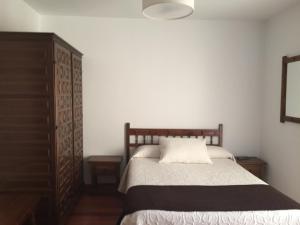 Postel nebo postele na pokoji v ubytování Hotel Rural Nova Ruta