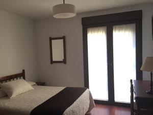 Postel nebo postele na pokoji v ubytování Hotel Rural Nova Ruta