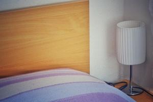 Postel nebo postele na pokoji v ubytování Ruzicin dvor