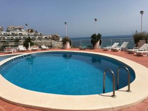 Bazén v ubytovaní Apartamento in Cullera. Spain alebo v jeho blízkosti