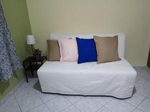 A bed or beds in a room at Monte Caputo Holiday House