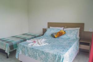 Postel nebo postele na pokoji v ubytování Pousada Acuípe