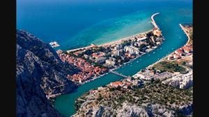 an aerial view of a city and a river at Apartments Iva und Franka in Omiš