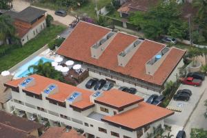 an overhead view of a building with red roof at Pousada Sol e Mar in Juquei