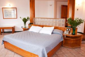 Un pat sau paturi într-o cameră la Casa Tobalá