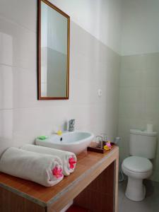 Kúpeľňa v ubytovaní Dwiki Putra Home Stay