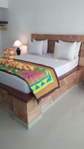 Postelja oz. postelje v sobi nastanitve Ocean Resort Amed