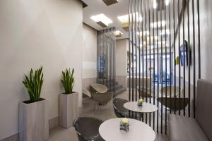 Posezení v ubytování Hotel Gamma