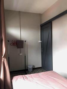 Postel nebo postele na pokoji v ubytování Chato Hostel