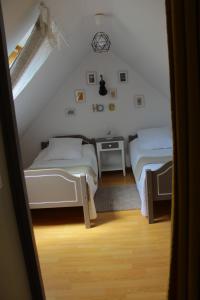 Postel nebo postele na pokoji v ubytování Chambres Du Marais