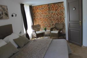 Postel nebo postele na pokoji v ubytování Chambres Du Marais