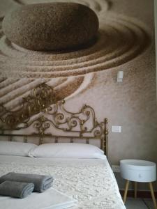 Ένα ή περισσότερα κρεβάτια σε δωμάτιο στο Il Viandante