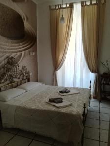 Ένα ή περισσότερα κρεβάτια σε δωμάτιο στο Il Viandante