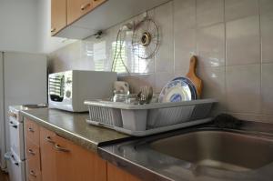 Dapur atau dapur kecil di Smeštaj - sobe MARVEL