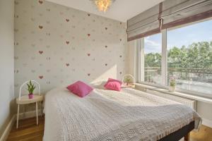 Postel nebo postele na pokoji v ubytování Penthouse