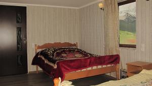 Postel nebo postele na pokoji v ubytování Ushguli Panorama Guest House