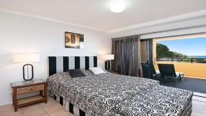 Llit o llits en una habitació de Heritage Pines Apartment by Kingscliff Accommodation