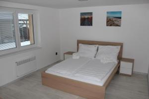 Postel nebo postele na pokoji v ubytování Vila Marianna