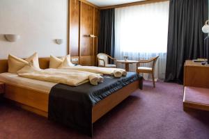Katil atau katil-katil dalam bilik di Hotel Jägerhaus