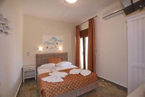 Кровать или кровати в номере Niki Apartments