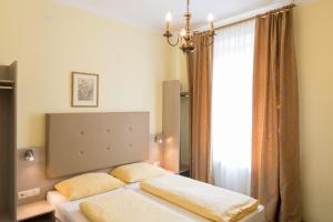 Postel nebo postele na pokoji v ubytování Hotel Lehenerhof + 17 fotografií