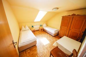 Postel nebo postele na pokoji v ubytování Hotel Lehenerhof