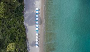 an overhead view of a row of buoys on a beach at Mirabilia Boutique Hotel in Kriopigi