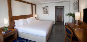 Voodi või voodid majutusasutuse Eko Hotel Main Building toas