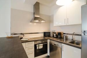 A kitchen or kitchenette at Armonia Park-Bajamar