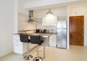 A kitchen or kitchenette at Armonia Park-Bajamar