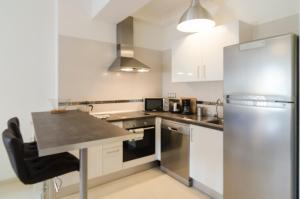 A kitchen or kitchenette at Armonia Park-Bajamar